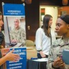Woman talking to a soldier woman in Kentucky, Fort Campbell