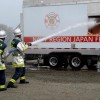 Two men splashing water in Fire and Emergency at Atsugi, Japan