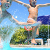 Kids Enjoying to Swim in Pearl Harbor, Hawaii