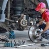 Mechanic Man Changing Ring of the Tire in  Tacoma, Washington State