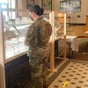 Soldier in a Food Stand in Kentucky, Fort Campbell