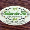 Salon De Lis Spa &amp; Boutique-sign