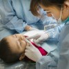 Dentist checking the teeth of the child in Osan, South Korea
