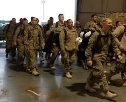 Deployment Support- Travis AFB-servicemen with their bags